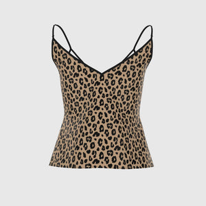 A ghosted back view of a Sahara leopard print camisole top with thin black spaghetti straps and black trim along the V-neckline, displayed against a solid light gray background.